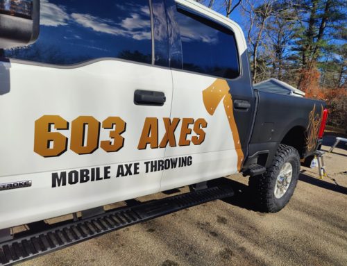 Stunning Partial Vehicle Wrap for 603 Axes in Tamworth, NH: A Bold Matte Black and Metallic Gold Design